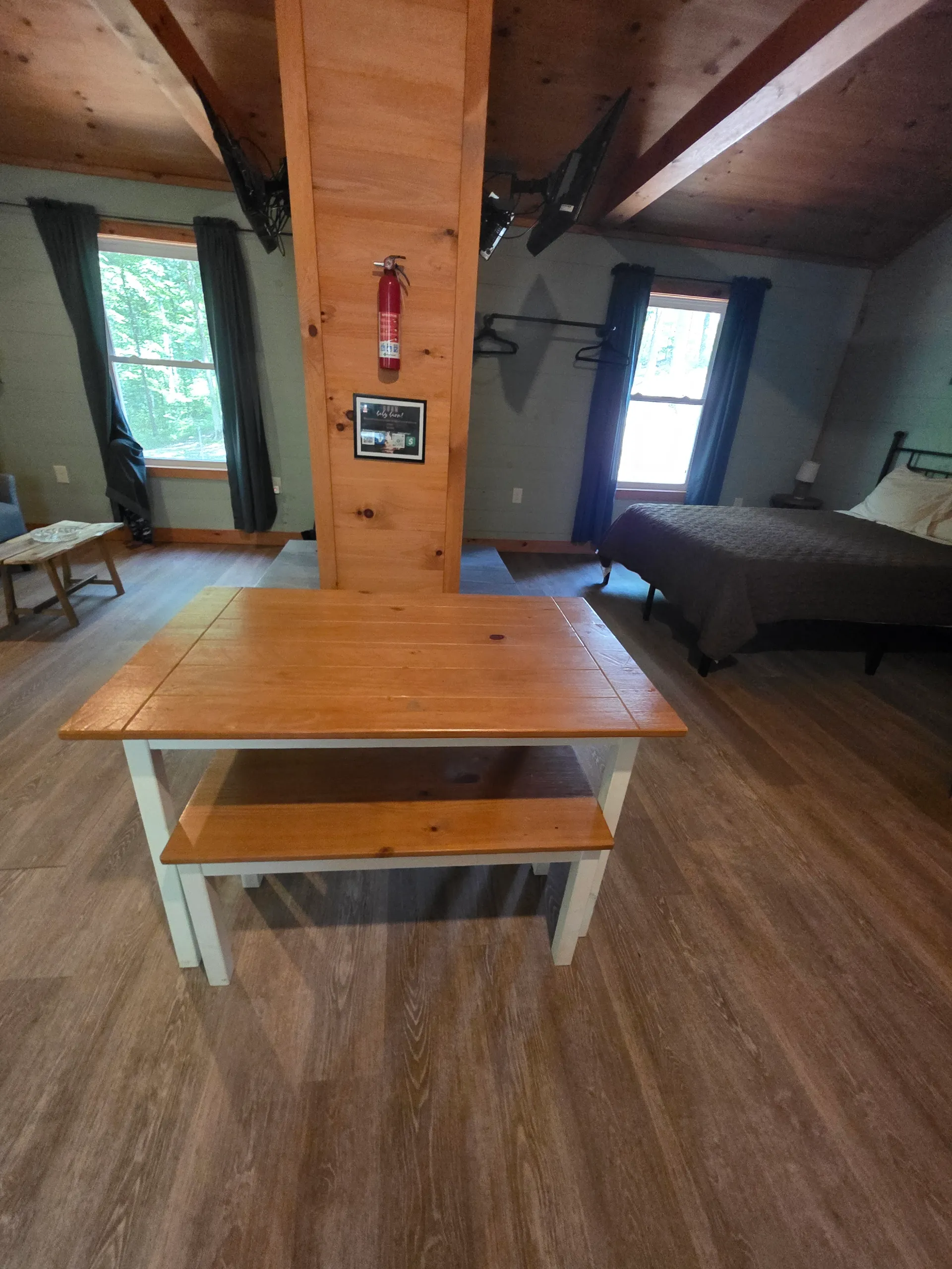 Double-sided fireplace viewed from the bedroom side at Dogwood Run cabin