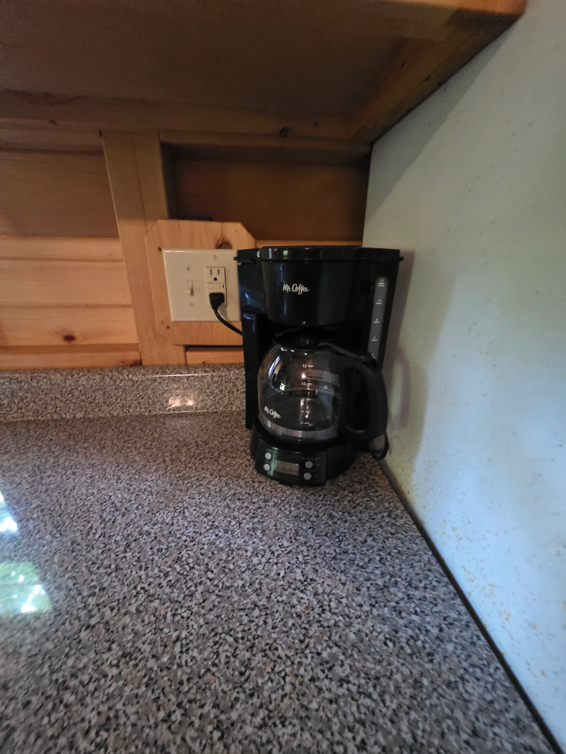Coffee maker on granite kitchen counter at Millers Den cabin